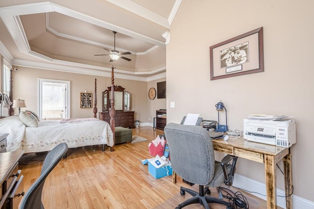 1765 Dew Pl, Marietta, GA 30064 - bedroom with crown molding, wood finished floors, an office area, a tray ceiling, and baseboards