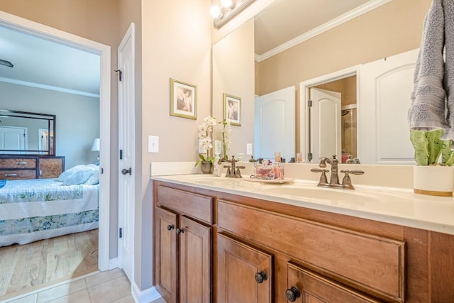 1765 Dew Pl, Marietta, GA 30064 - ensuite bathroom featuring crown molding, double vanity, and tile patterned floors