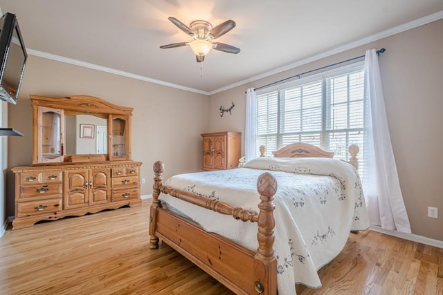 1765 Dew Pl, Marietta, GA 30064 - bedroom featuring light wood-style floors, ornamental molding, baseboards, and ceiling fan
