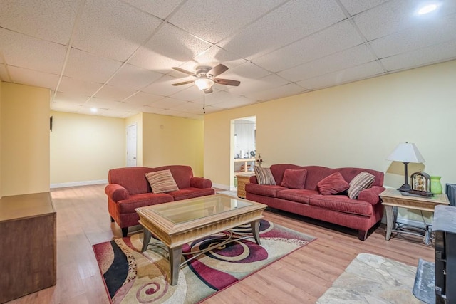 1765 Dew Pl, Marietta, GA 30064 - living area featuring wood finished floors, ceiling fan, and a drop ceiling