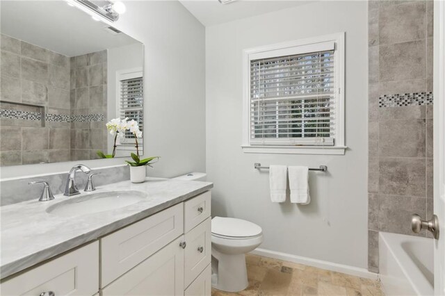 bathroom featuring tiled shower / bath combo