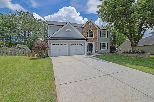 traditional-style home with driveway and a garage