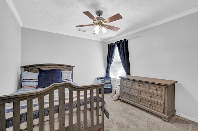 bedroom with light colored carpet, crown molding, a textured ceiling, baseboards, and ceiling fan