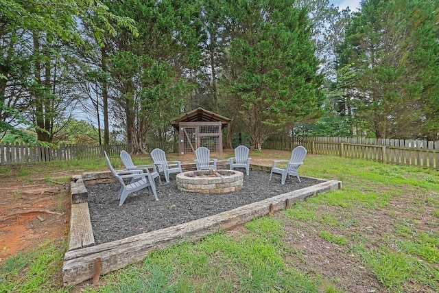 view of yard featuring a gazebo and a fire pit