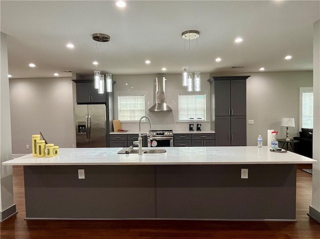 1255 Plaza Ave SW, Atlanta, GA 30310 - kitchen with wall chimney exhaust hood, stainless steel appliances, a sink, a large island, and light countertops