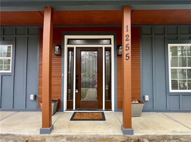 1255 Plaza Ave SW, Atlanta, GA 30310 - doorway to property featuring board and batten siding and covered porch