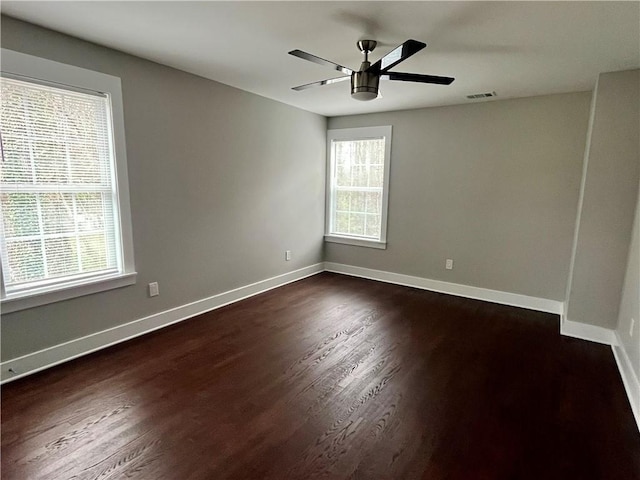 1255 Plaza Ave SW, Atlanta, GA 30310 - unfurnished room featuring dark wood-style flooring, baseboards, and ceiling fan