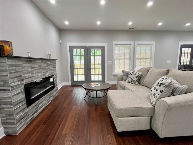 1255 Plaza Ave SW, Atlanta, GA 30310 - living room featuring recessed lighting, baseboards, dark wood-style floors, french doors, and a glass covered fireplace