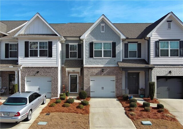 view of exterior entry with a garage