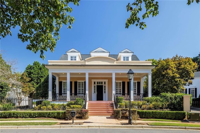 greek revival inspired property with covered porch