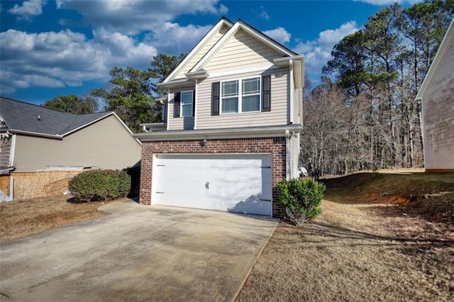 view of front facade featuring concrete driveway, brick siding, and an attached garage