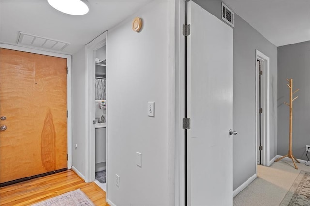 hallway featuring light wood-type flooring