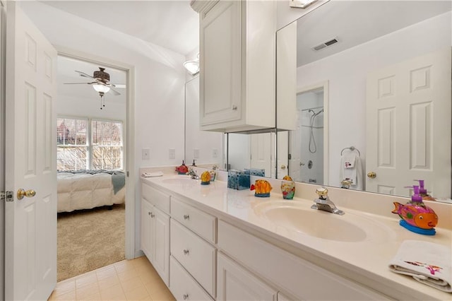 bathroom with ensuite bath, a sink, visible vents, and walk in shower