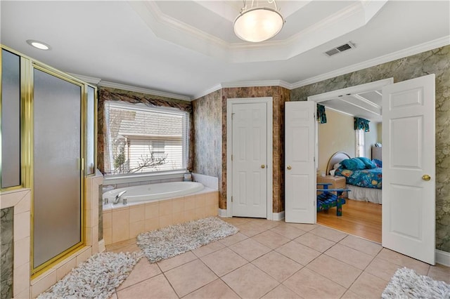 bathroom with ornamental molding, a raised ceiling, visible vents, and tile patterned floors