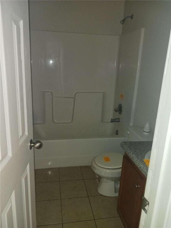 full bathroom featuring tile patterned flooring, vanity, shower / bathtub combination, and toilet