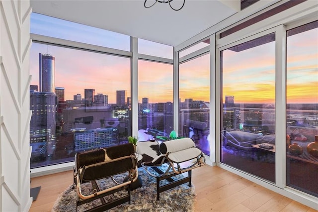 45 Ivan Allen Jr Blvd NW Unit 2505, Atlanta, GA 30308 - sunroom / solarium featuring a skyline view, wood finished floors, and a wall of windows