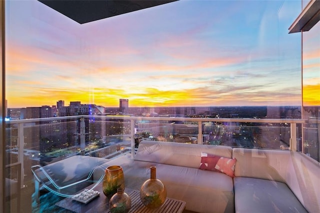45 Ivan Allen Jr Blvd NW Unit 2505, Atlanta, GA 30308 - balcony at dusk featuring a view of city and an outdoor hangout area