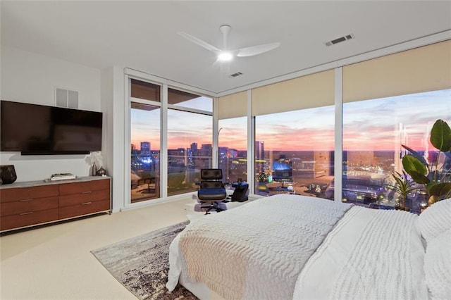 45 Ivan Allen Jr Blvd NW Unit 2505, Atlanta, GA 30308 - bedroom featuring carpet floors, expansive windows, and ceiling fan