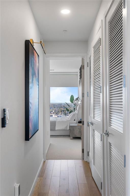 45 Ivan Allen Jr Blvd NW Unit 2505, Atlanta, GA 30308 - corridor featuring baseboards and wood finished floors