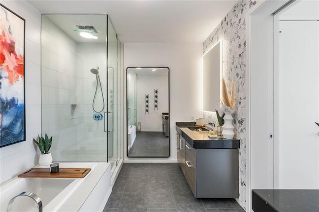 45 Ivan Allen Jr Blvd NW Unit 2505, Atlanta, GA 30308 - bathroom featuring vanity, a shower stall, a bathtub, and tile patterned flooring