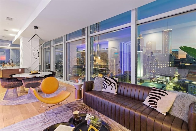 45 Ivan Allen Jr Blvd NW Unit 2505, Atlanta, GA 30308 - living room with wood finished floors and floor to ceiling windows