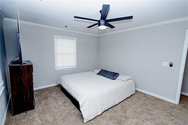 bedroom featuring baseboards, carpet floors, visible vents, and ornamental molding