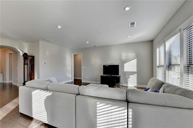 living room featuring dark hardwood / wood-style floors