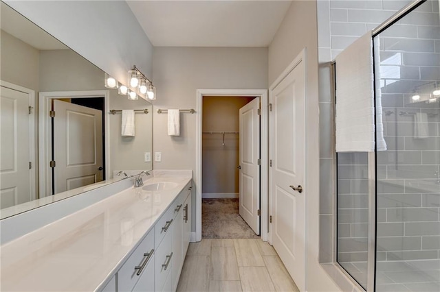 bathroom featuring vanity and walk in shower