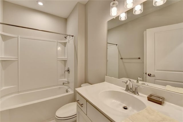 full bathroom with washtub / shower combination, vanity, and toilet