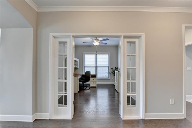 interior space featuring ornamental molding, dark wood-type flooring, and french doors