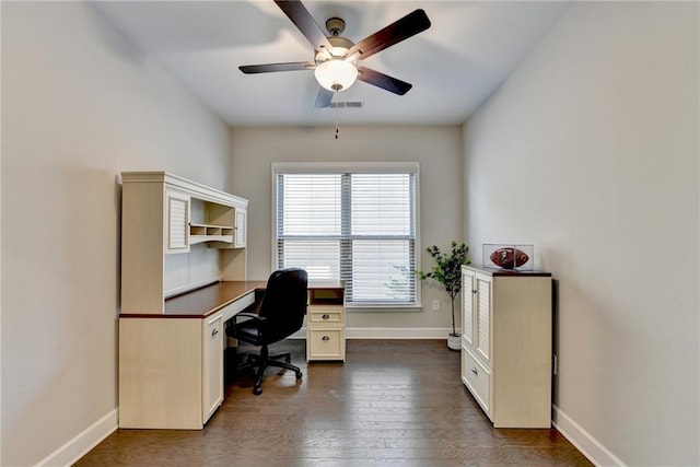 office with dark hardwood / wood-style flooring and ceiling fan