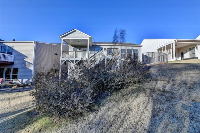 view of front of house featuring covered porch and a carport