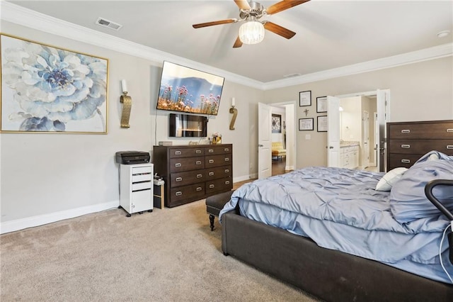 244 Lotus Cir, Mcdonough, GA 30252 - carpeted bedroom with visible vents, baseboards, ensuite bath, and crown molding