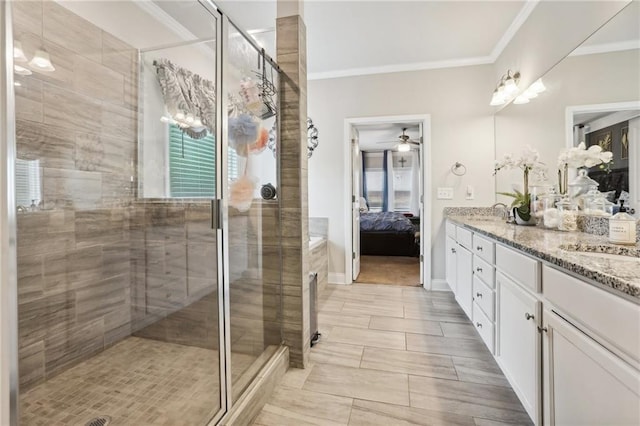 244 Lotus Cir, Mcdonough, GA 30252 - full bathroom featuring baseboards, ensuite bath, double vanity, a shower stall, and crown molding