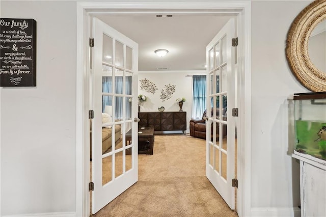 244 Lotus Cir, Mcdonough, GA 30252 - hallway featuring carpet flooring and french doors