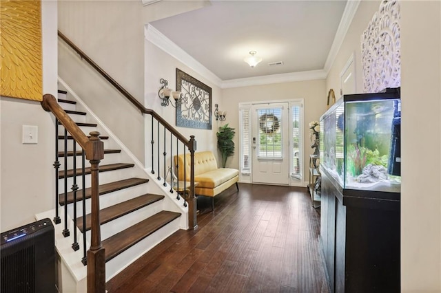 244 Lotus Cir, Mcdonough, GA 30252 - entrance foyer with dark wood finished floors, stairs, visible vents, and ornamental molding