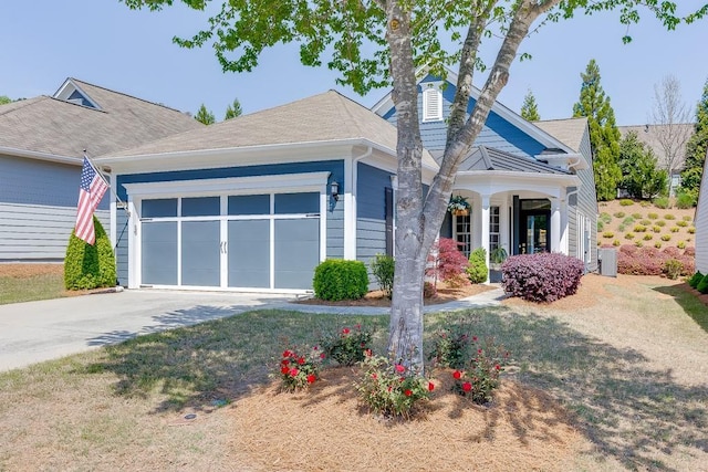 view of front of property featuring driveway and an attached garage