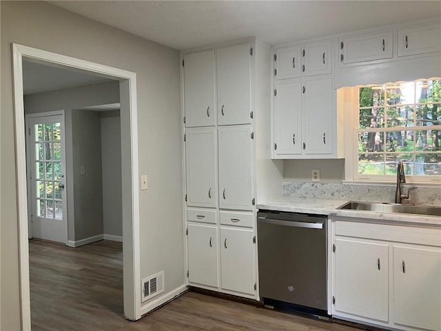 kitchen featuring sink, dark hardwood / wood-style floors, white cabinets, and dishwasher