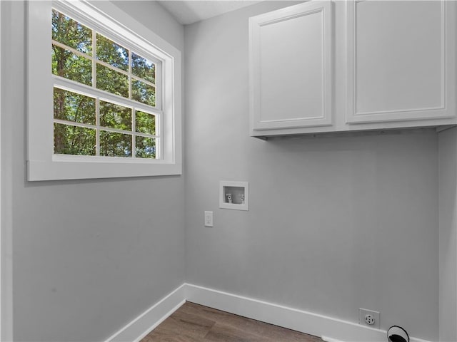 220 Sugar Hill Ct, Jackson, GA 30233 - laundry area with cabinet space, baseboards, dark wood-style floors, hookup for an electric dryer, and hookup for a washing machine