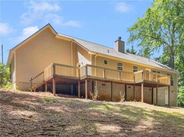220 Sugar Hill Ct, Jackson, GA 30233 - back of property featuring a wooden deck and a chimney