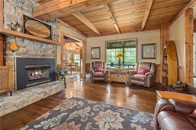 259 Eagle Chase Cir, Dillard, GA 30537 - living room featuring a wood ceiling with exposed beams, hardwood / wood-style floors, wainscoting, a fireplace, and a chandelier