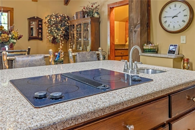 259 Eagle Chase Cir, Dillard, GA 30537 - kitchen with black electric stovetop and light stone countertops