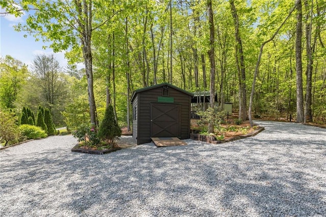 259 Eagle Chase Cir, Dillard, GA 30537 - view of shed with a forest view