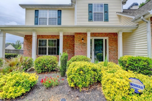 entrance to property with covered porch