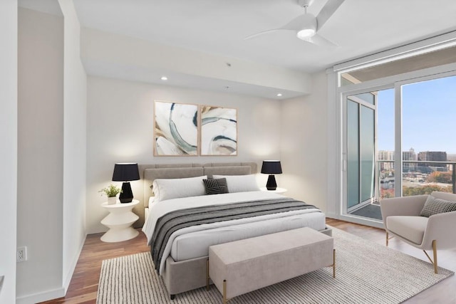 3325 Piedmont Rd NE Unit 2104, Atlanta, GA 30305 - bedroom featuring wood finished floors, access to outside, baseboards, a ceiling fan, and recessed lighting