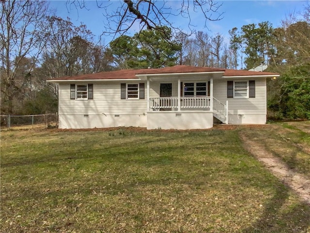 view of front of home with a front lawn, fence, covered porch, and crawl space