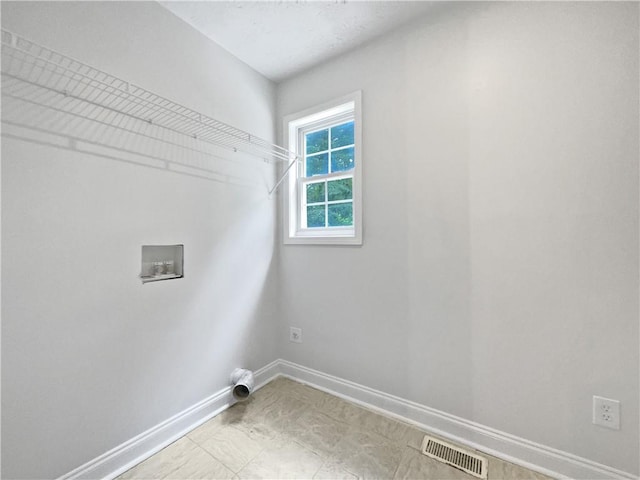 643 Windy Mill Way, Temple, GA 30179 - laundry area featuring baseboards and washer hookup