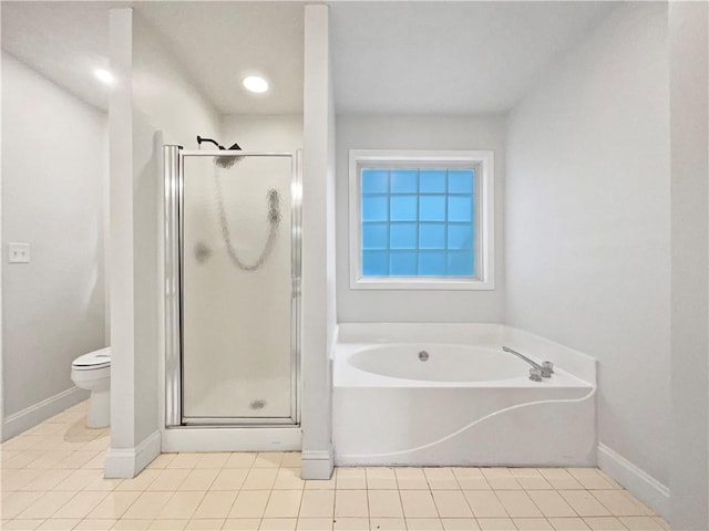 643 Windy Mill Way, Temple, GA 30179 - bathroom featuring a bath, a stall shower, and tile patterned flooring