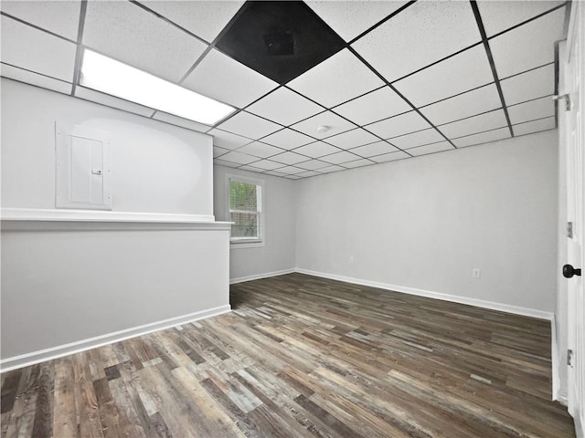 643 Windy Mill Way, Temple, GA 30179 - unfurnished room featuring electric panel, wood finished floors, and a paneled ceiling