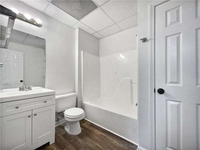 643 Windy Mill Way, Temple, GA 30179 - full bath with a drop ceiling, wood finished floors, vanity, and shower / bath combination
